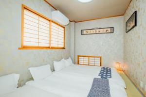 大阪的住宿－New 敷津西兩層民宿 最多可容納13人 大国町站步行5分 交通便利，相簿中的一張相片