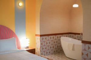 Postel nebo postele na pokoji v ubytování The Très Hotel + 37 fotografií