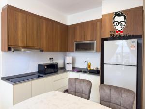 Nhà bếp/bếp nhỏ tại Staycation Homestay 58 Podium Apartment
