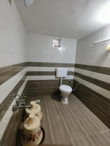 Koupelna v ubytování Rannkaar Village Resort