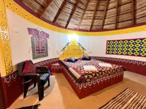 Postel nebo postele na pokoji v ubytování Rannkaar Village Resort