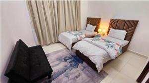 Elegant Villa Rooms in Dubai near Airport客房内的一张或多张床位