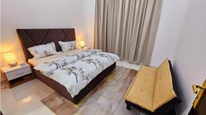 Postel nebo postele na pokoji v ubytování Deluxe Villa Rooms near Dubai Airport