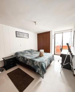 Ένα ή περισσότερα κρεβάτια σε δωμάτιο στο Art Chill Studio