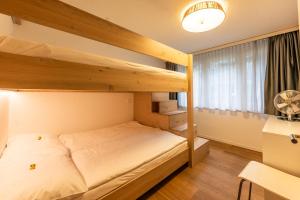 Postel nebo postele na pokoji v ubytování Balmas Paradies-perfect family home