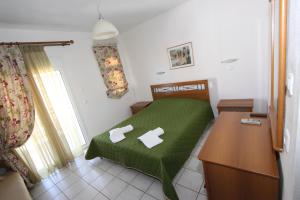 A bed or beds in a room at Badis Haus