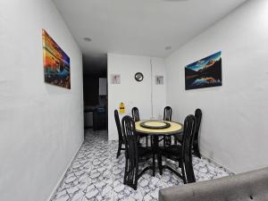 Un lugar para sentarse en Homestay Una Kangar