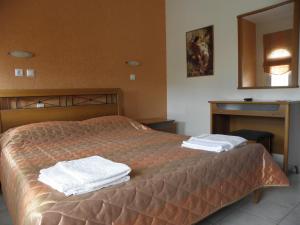 A bed or beds in a room at Badis Haus