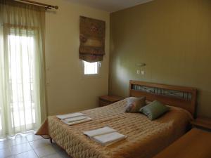 A bed or beds in a room at Badis Haus