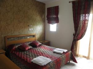 A bed or beds in a room at Badis Haus