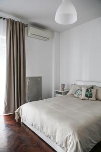 Postel nebo postele na pokoji v ubytování Vita Home