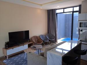 Μια τηλεόραση ή/και κέντρο ψυχαγωγίας στο Villa Panderman Batu Malang