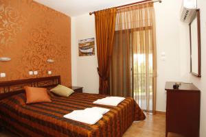 A bed or beds in a room at Badis Haus
