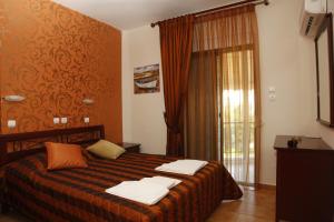 A bed or beds in a room at Badis Haus