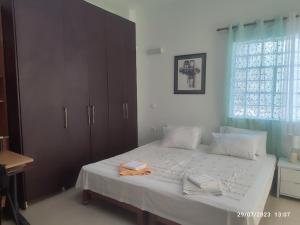 Ένα ή περισσότερα κρεβάτια σε δωμάτιο στο Just 4 you apartment +4 φωτογραφίες