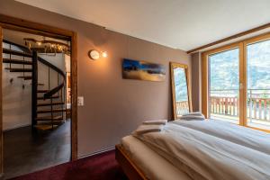 Postel nebo postele na pokoji v ubytování Duplex de charme à Zermatt
