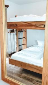Postel nebo postele na pokoji v ubytování Toni Hütte am Riesserkopf + 31 fotografií