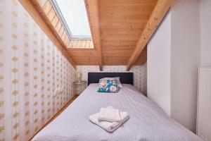 Postel nebo postele na pokoji v ubytování Design apartment + 14 fotografií