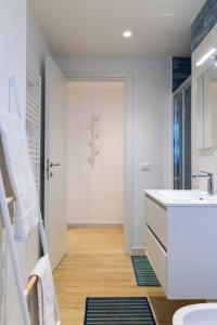 a bathroom with a sink and a mirror at Casa cancello a mare in Santa Flavia +25 photos