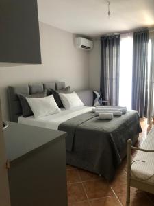 Postel nebo postele na pokoji v ubytování Apartament Raci