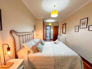 Łóżko lub łóżka w pokoju w obiekcie Apartamento completo, amplio, muy iluminado y con plaza de garaje incluida.