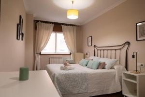 Łóżko lub łóżka w pokoju w obiekcie Apartamento completo, amplio, muy iluminado y con plaza de garaje incluida.