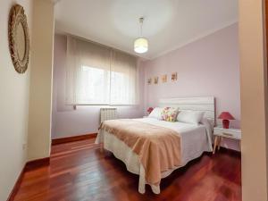 Łóżko lub łóżka w pokoju w obiekcie Apartamento completo, amplio, muy iluminado y con plaza de garaje incluida.