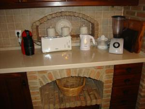 Příslušenství pro přípravu čaje a kávy v ubytování Quinta dos Migueis
