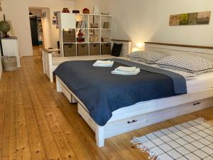 Posteľ alebo postele v izbe v ubytovaní Apartmán č.2