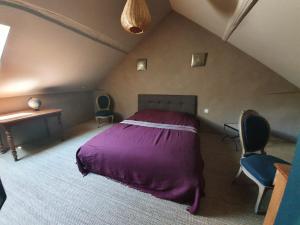 Ένα ή περισσότερα κρεβάτια σε δωμάτιο στο Maison de charme