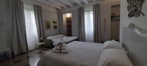 Posteľ alebo postele v izbe v ubytovaní Langhe di Liguria B&B