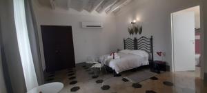 Posteľ alebo postele v izbe v ubytovaní Langhe di Liguria B&B