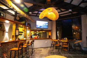 TV o dispositivi per l'intrattenimento presso The Hideout Villa Pokhara