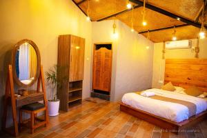 Letto o letti in una camera di The Hideout Villa Pokhara