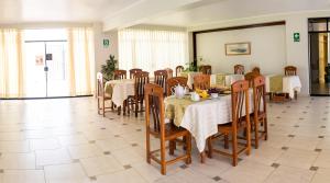 Un restaurante o sitio para comer en Hospedaje Dulce Estancia