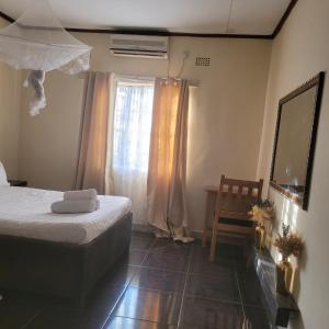 Cama o camas de una habitación en Quest