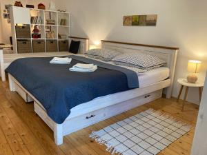 Posteľ alebo postele v izbe v ubytovaní Apartmán č.2