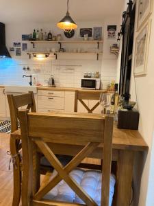 Kuchyňa alebo kuchynka v ubytovaní Apartmán č.2