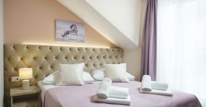Ein Bett oder Betten in einem Zimmer der Unterkunft Hotel Stella Maris - Style & Comfort