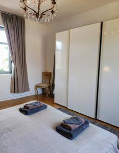 Postel nebo postele na pokoji v ubytování OSCARs B&B