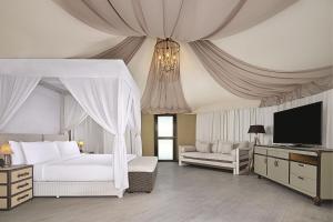 Natra Bintan, a Tribute Portfolio Resort客房内的一张或多张床位