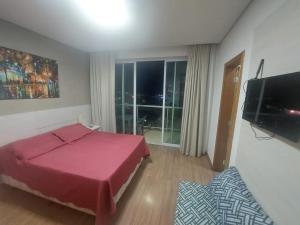 Photo de la galerie de l'établissement Apto 401, ótima localização, self check-in, wi-fi, varanda e vista linda, 14km aeroporto, à Lagoa Santa