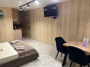 Postel nebo postele na pokoji v ubytování Міні Готель SPA Excellent Family