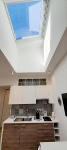 A kitchen or kitchenette at BARBARA Classy Apartment 101