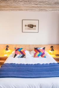 Cama ou camas em um quarto em Hôtel Montholon