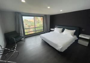 Postel nebo postele na pokoji v ubytování Très Beau Duplexe avec piscine depuis la terrasse + 21 fotografií