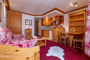 Kuchyň nebo kuchyňský kout v ubytování Eskival Elegance by Alpstays + 8 fotografií