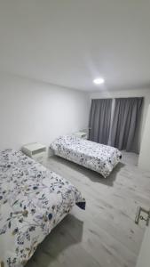 Postel nebo postele na pokoji v ubytování Depto moderno a estrenar!!!