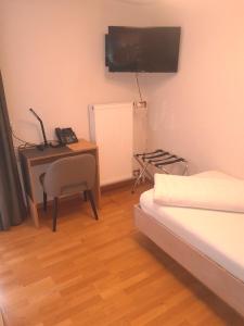Ένα ή περισσότερα κρεβάτια σε δωμάτιο στο Hotel & Restaurant Fischer