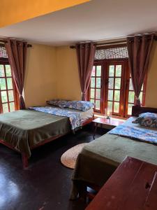 Postel nebo postele na pokoji v ubytování Pekoe villa Watagoda + 28 fotografií